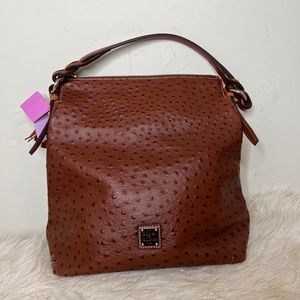 Satchel Ostrich. One strap and zipper gold hardware. Bag by Dooney&Bourke